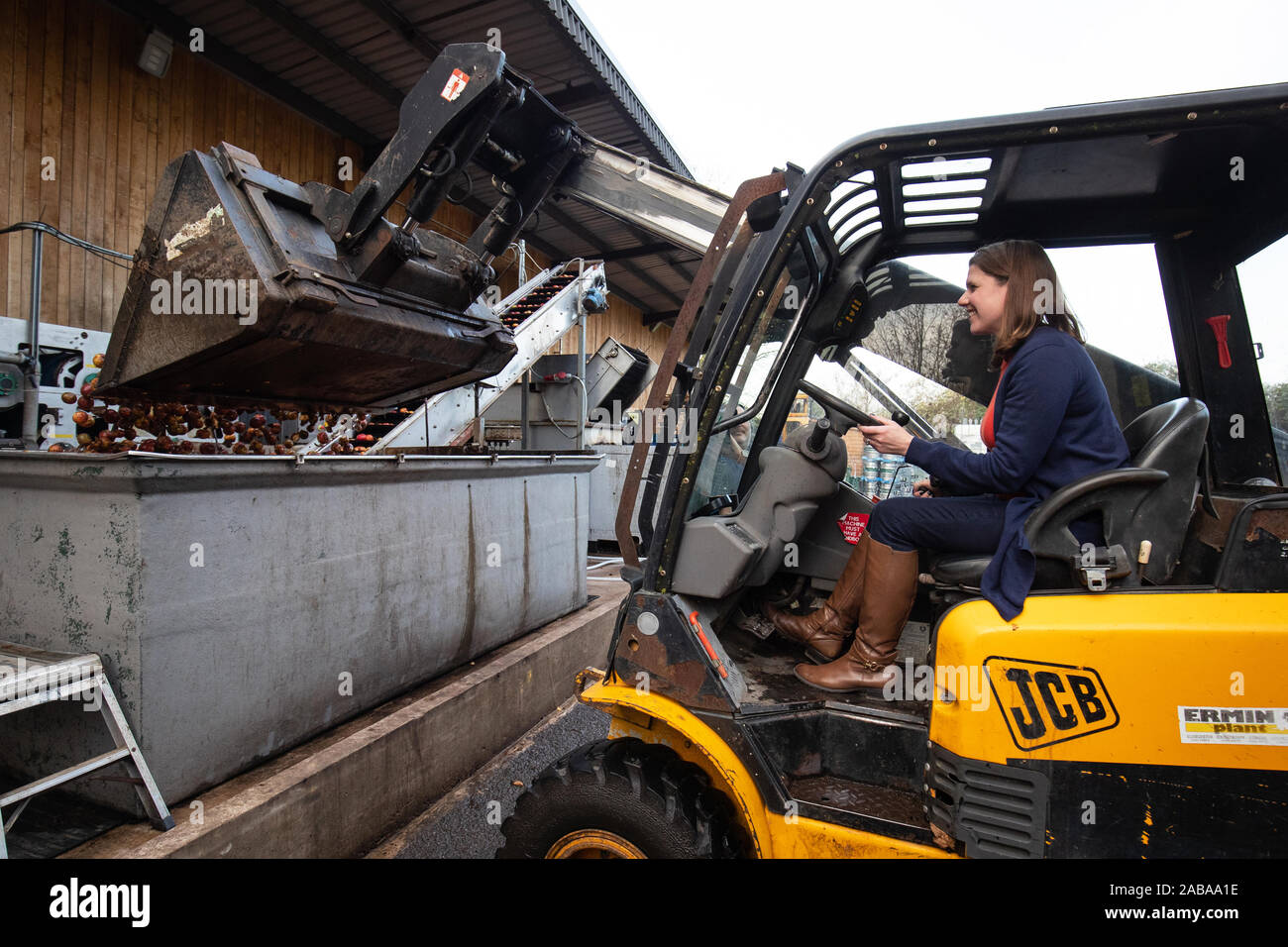 Liberal Democrat leader Jo Swinson drives a JCB during a visit to Dunkertons Cider Company, an organic and plastic free brewery in Cheltenham, Gloucestershire, during campaigning for the General Election. Stock Photo