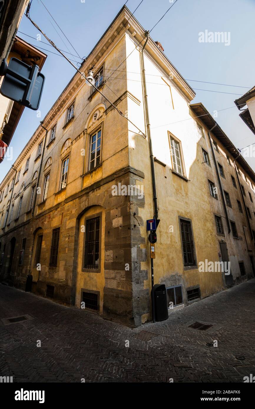 Social Theatre of Bergamo (Teatro Sociale di Bergamo), entrance located on a narrow cobbled street in the Upper City (CittÃ  Alta), Bergamo, Stock Photo