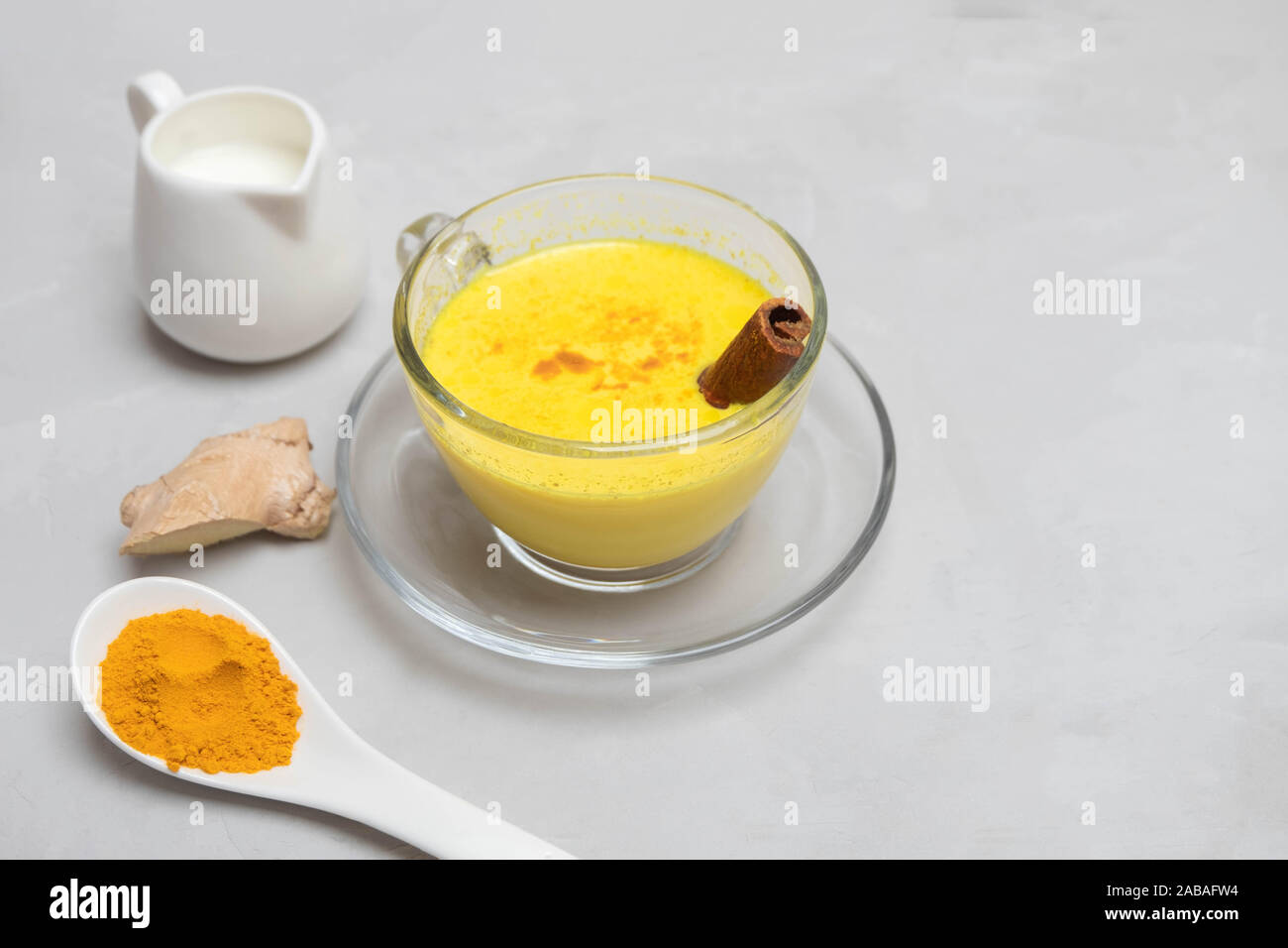 Healthy ayurvedic drink turmeric golden milk with turmeric powder