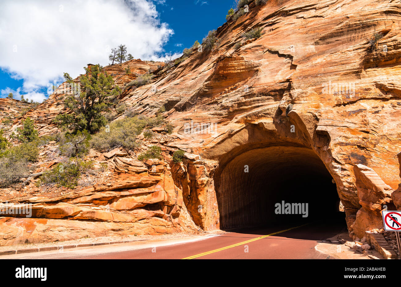 Tunnel through the rocks at Zion National Park Stock Photo Alamy