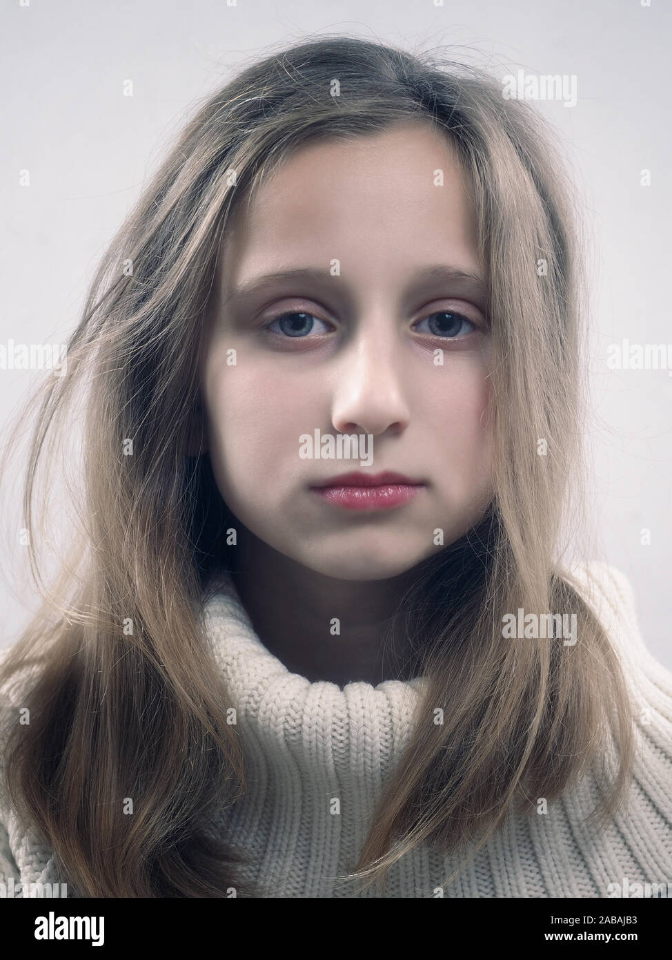 Portrait of a beautiful young girl on a white background Stock Photo ...