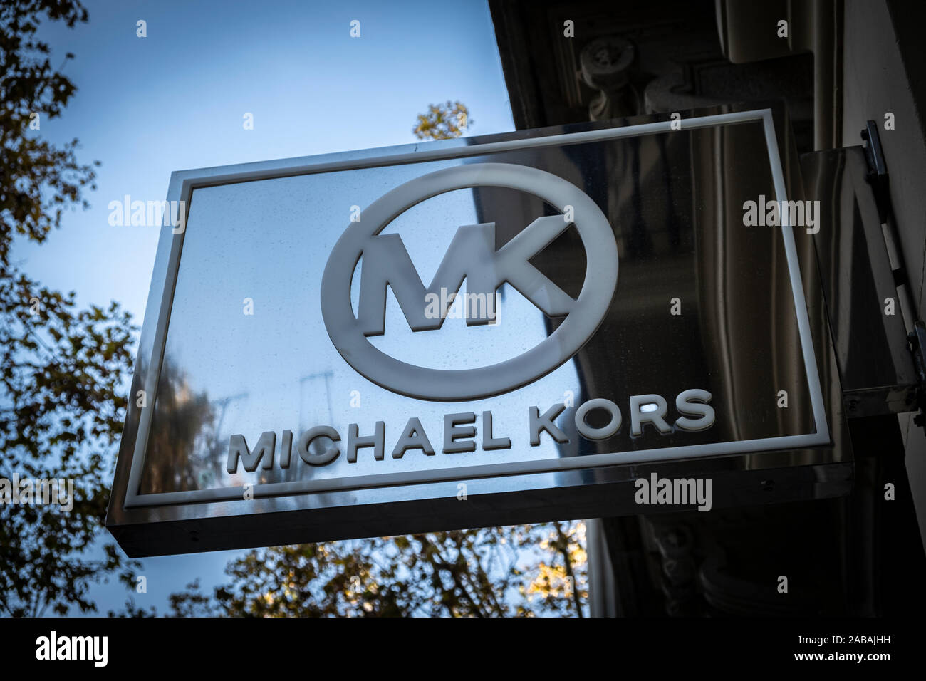 The logo of Michael Kors, manufacturer and marketer of luxury clothing and  accessories seen at the Passeig de Gràcia store.A boulevard of just over a  kilometre, the Passeig de Gràcia store brings