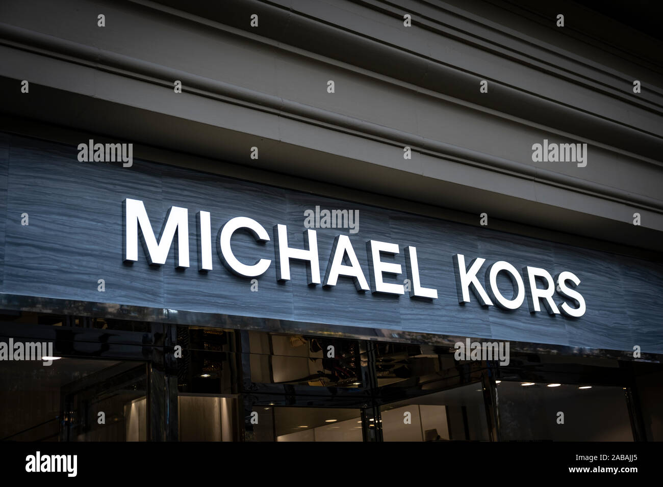 The logo of Michael Kors, manufacturer and marketer of luxury clothing and  accessories seen at the Passeig de Gràcia store.A boulevard of just over a  kilometre, the Passeig de Gràcia store brings