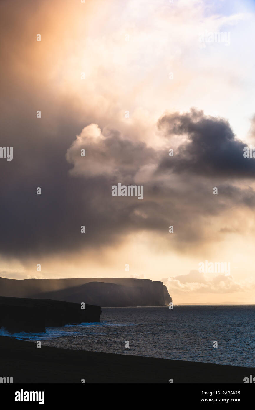 Dramatic sky over the cliffs at Yesnaby, Orkney, Scotland, UK Stock Photo