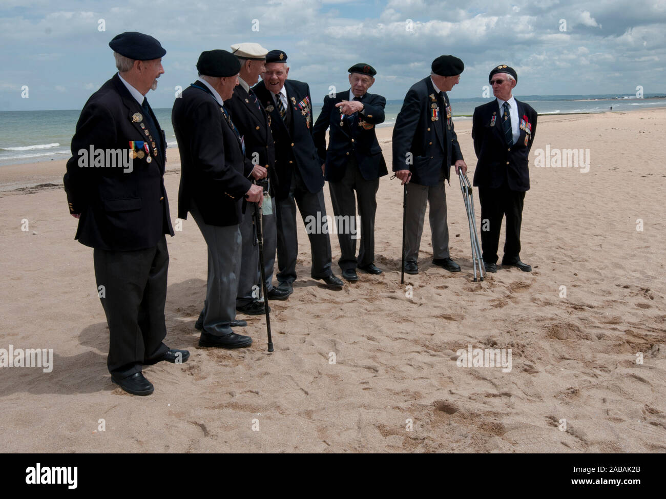 Members of the Wiltshire  Normandy 'Gunner' Veterans  association on Sword beach, Hermanville Sur Mer  in Normandy  ahead of the D-Day celebrations. Stock Photo