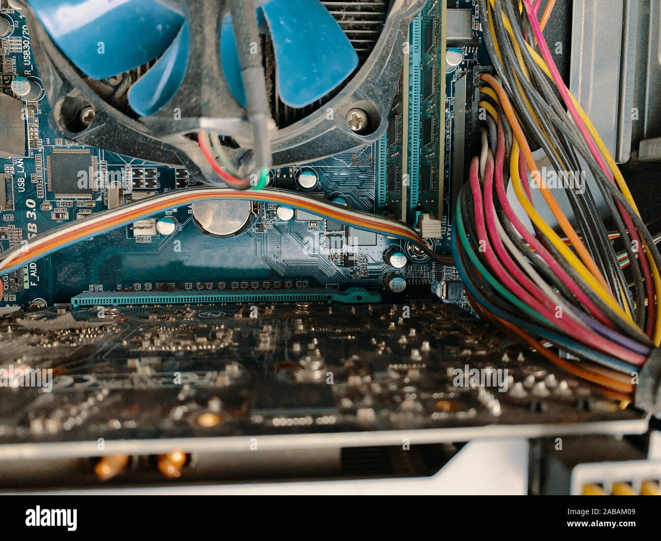 Dust in computer case. Big part of dirty dust on the computer pc processor cooler with mainboard