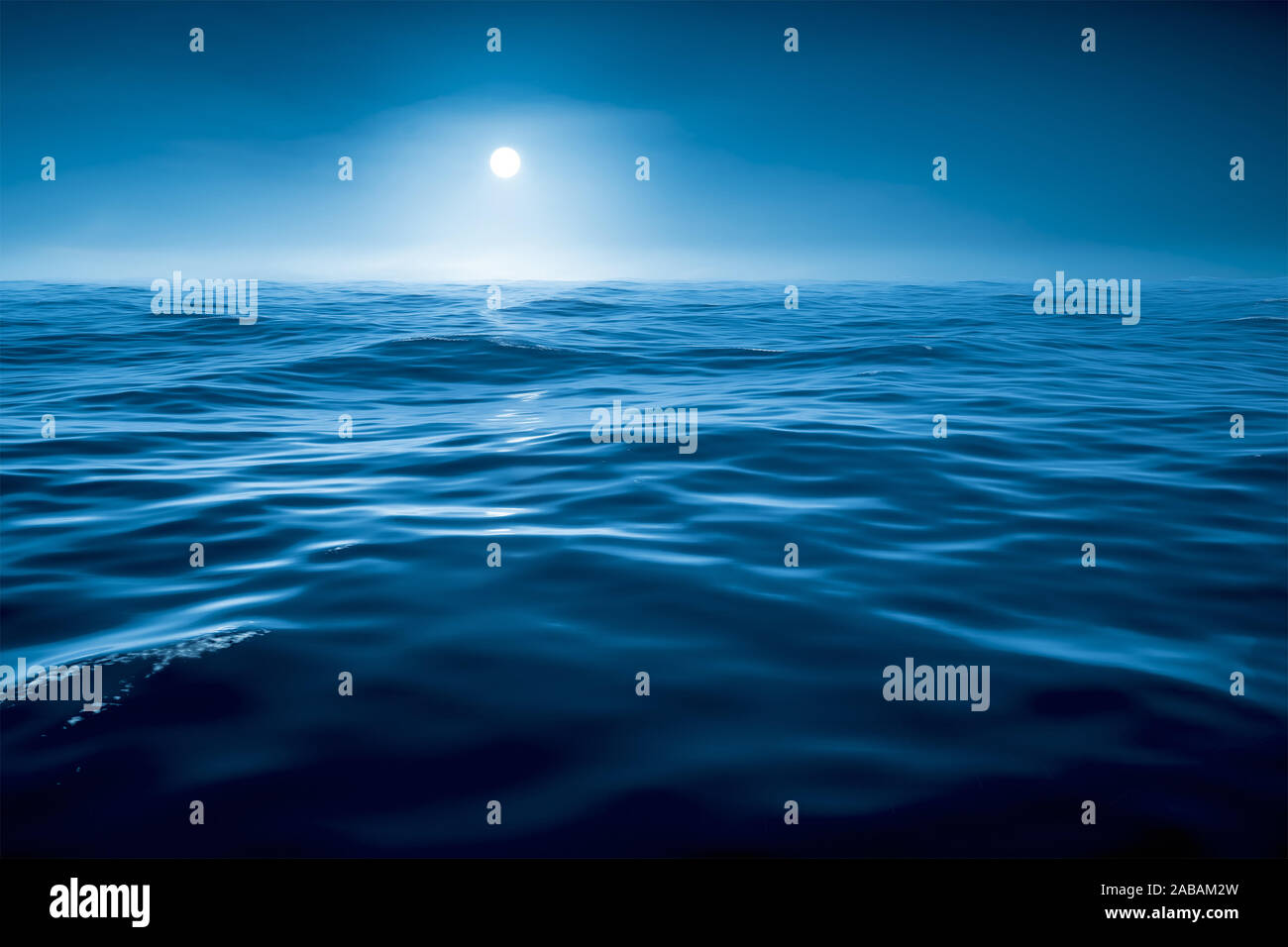 Eine wunderschoene Vollmondnacht ueber dem Ozean Stock Photo