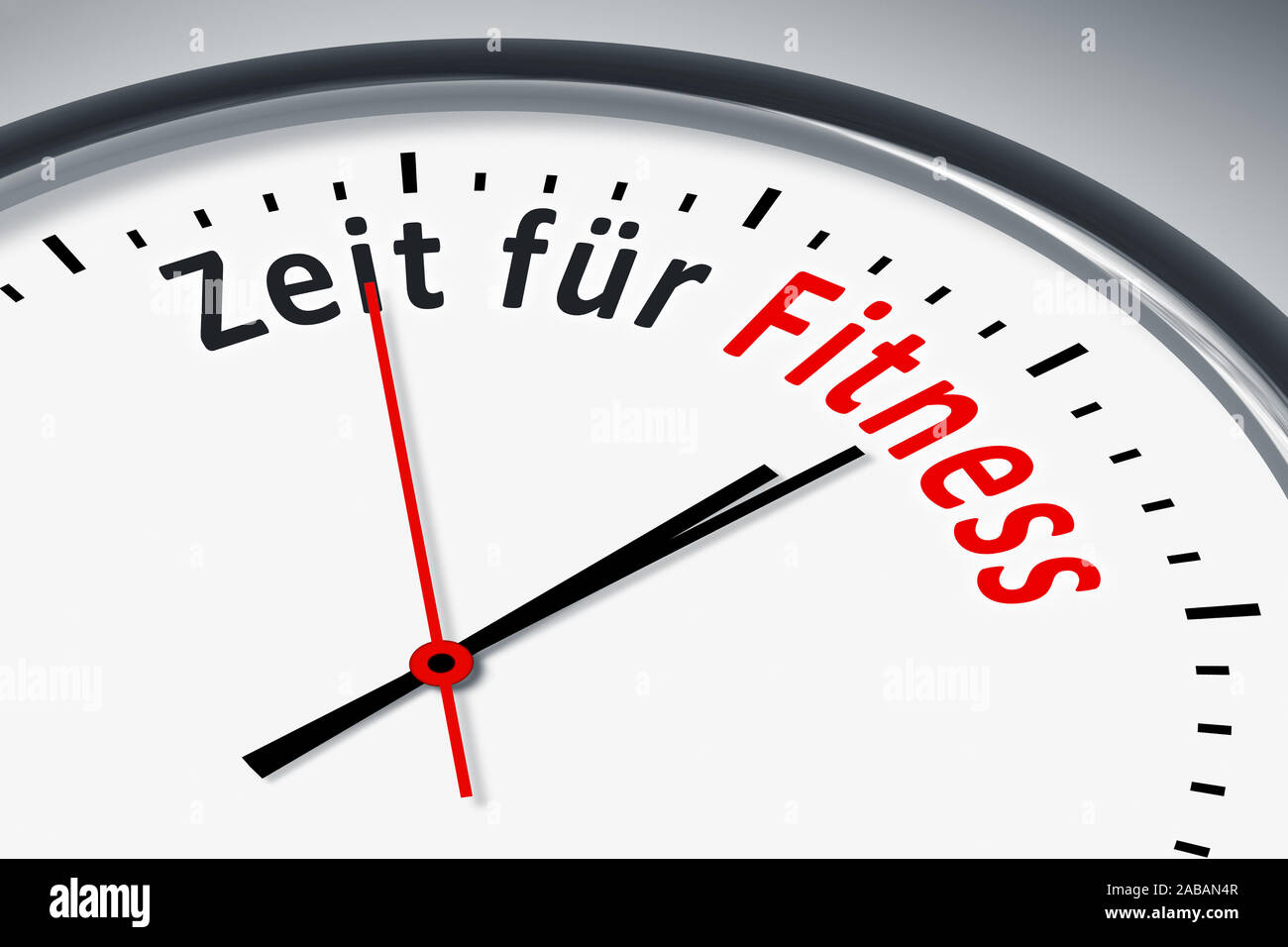 Ein simples Ziffernblatt mit der Aufschrift: 'Zeit fuer Fitness' Stock Photo