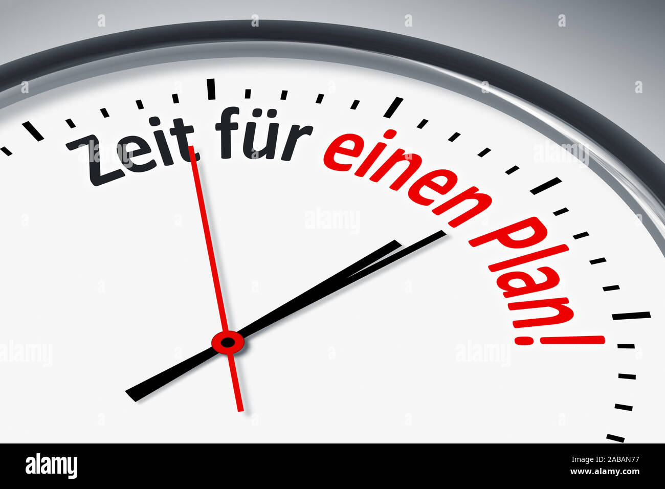 Ein simples Ziffernblatt mit der Aufschrift: 'Zeit fuer einen Plan!' Stock Photo
