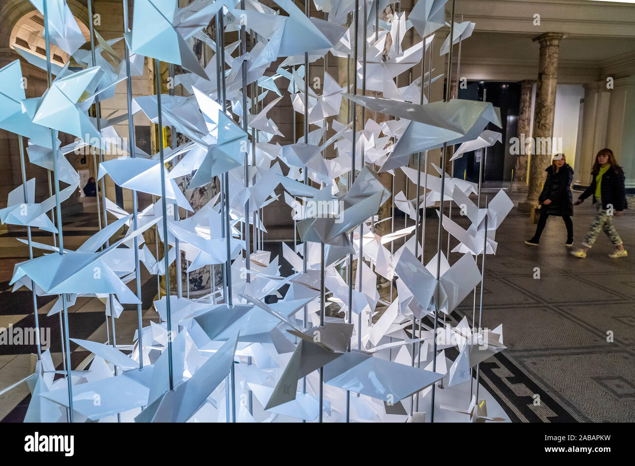 London, UK. 26th Nov 2019. The V&A Christmas tree installation, 'Freedom', is a contemporary reimagining of the Christmas tree and is the centrepiece of the this year's bicentenary celebrations, marking the 200th anniversary of Queen Victoria and Prince Albert's births. Each of the 200 ornately folded origami birds represents a year of the bicentenary. Created by designer Anna Hünnerkopf as part of a competition for students of the University of Applied Sciences in Coburg. Credit: Guy Bell/Alamy Live News Stock Photo
