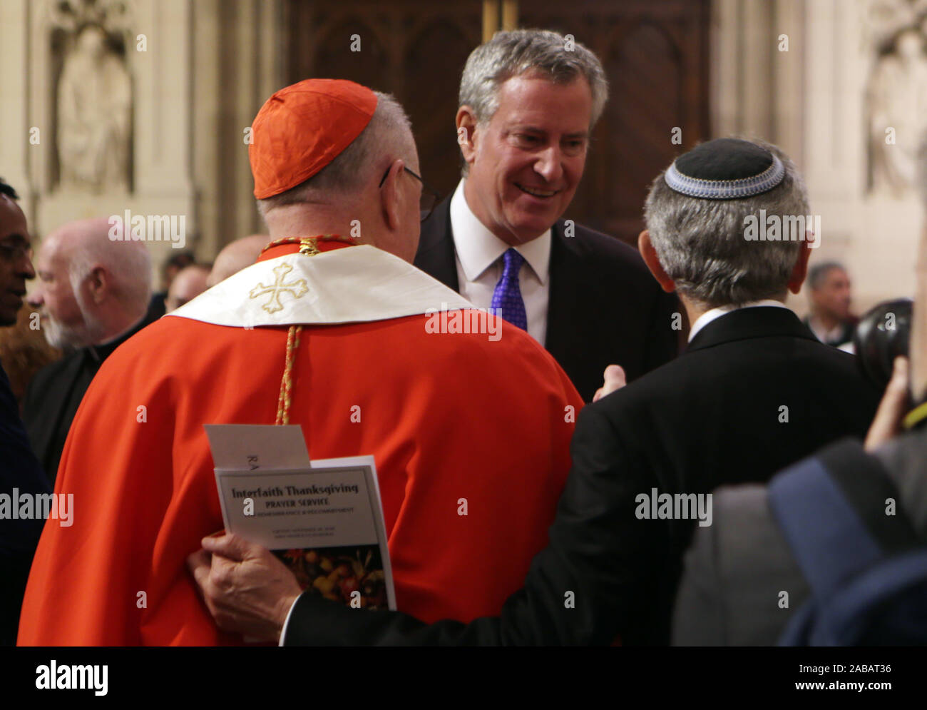 New York, NY, USA. 26th Nov, 2019. New York City Mayor Bill De Blasio along with Arch Bishop of New York Cardinal Timothy Michael Dolan and other religious leaders deliver remarks during the Thanksgiving Prayer Service for Remembrance and Recommitment at St. Patrick's Cathedral on November 26, 2019 in New York City. Credit: Mpi43/Media Punch/Alamy Live News Stock Photo