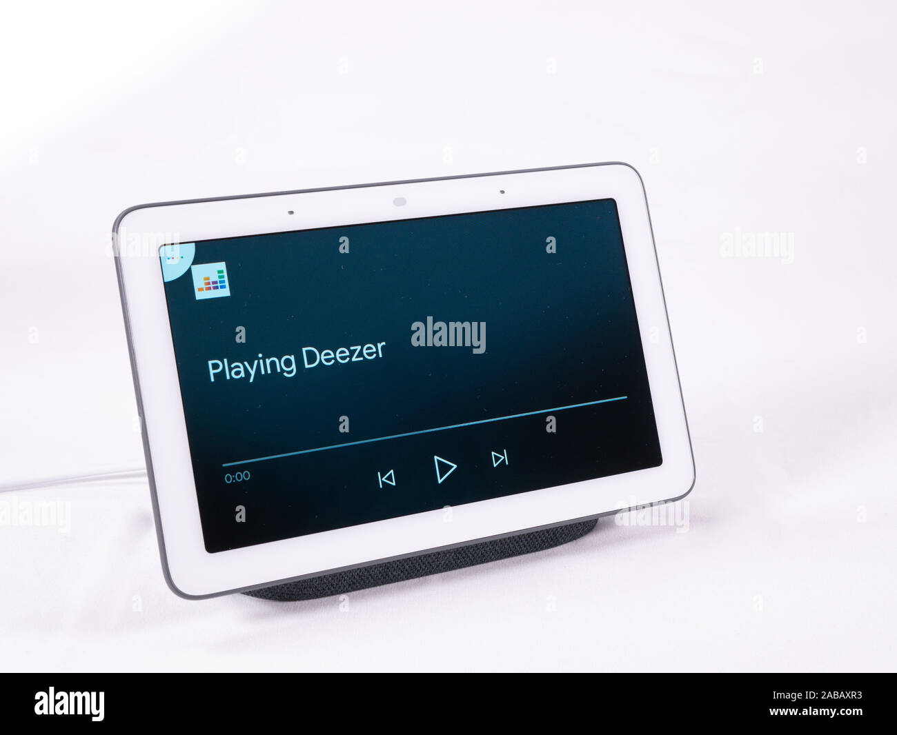 Nov 2019, UK - Google Nest Hub smart home voice assistant speaker playing  music on deezer with touch controls Stock Photo - Alamy