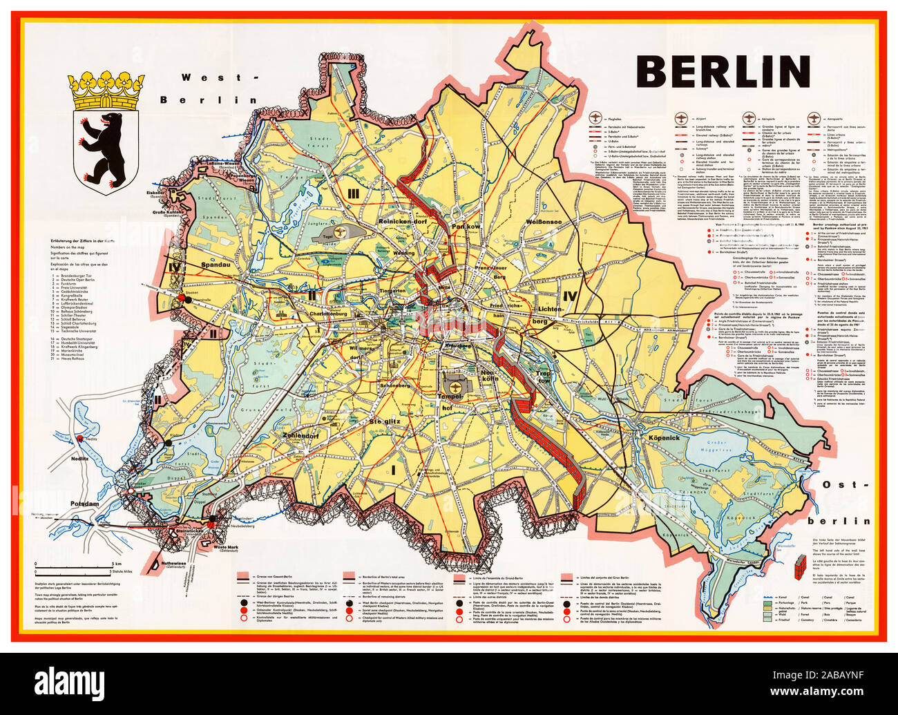 BERLIN WALL Vintage 1960’s Berlin Cold War Propaganda map illustration showing the Berlin Wall as a bricked-up barrier and barbed wire surrounding West Berlin. Airports, government buildings, factories and other sites are shown in the West, but none in the East. Detailed explanations of transportation, borders and border crossing are provided in German, English, French and Spanish - but not in Russian. The map was published by the Press and Information Office of the State of Berlin, in 1963. Germany Stock Photo