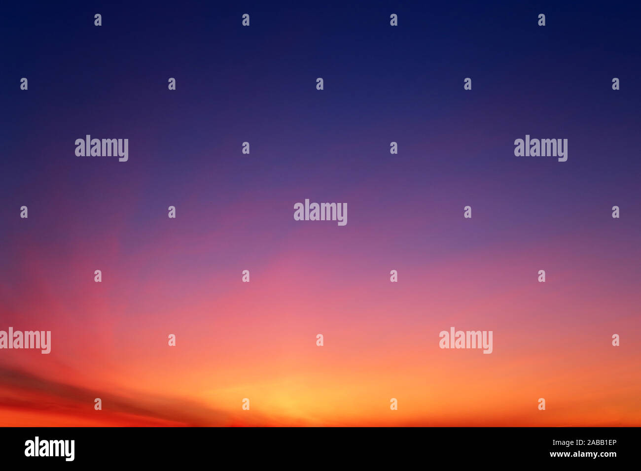 Sunrise on a sky, scenic view with soft colors. Pink, orange and dark blue horizon, space and stratosphere for background Stock Photo
