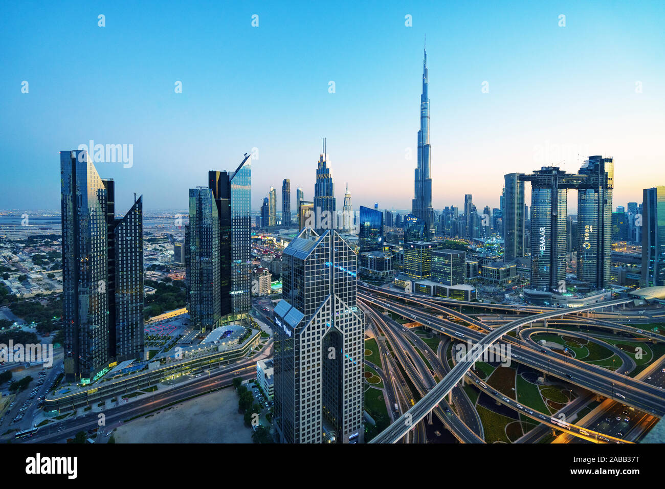 Skyline of Dubai, Sheikh Zayed Road and Burj Khalifa skyscraper at dusk