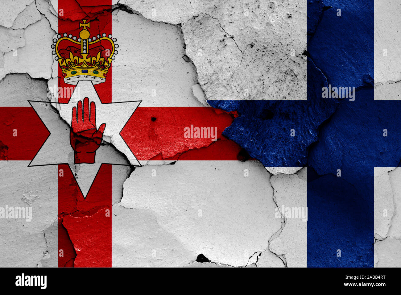flags of Northern Ireland and Finland painted on cracked wall Stock ...