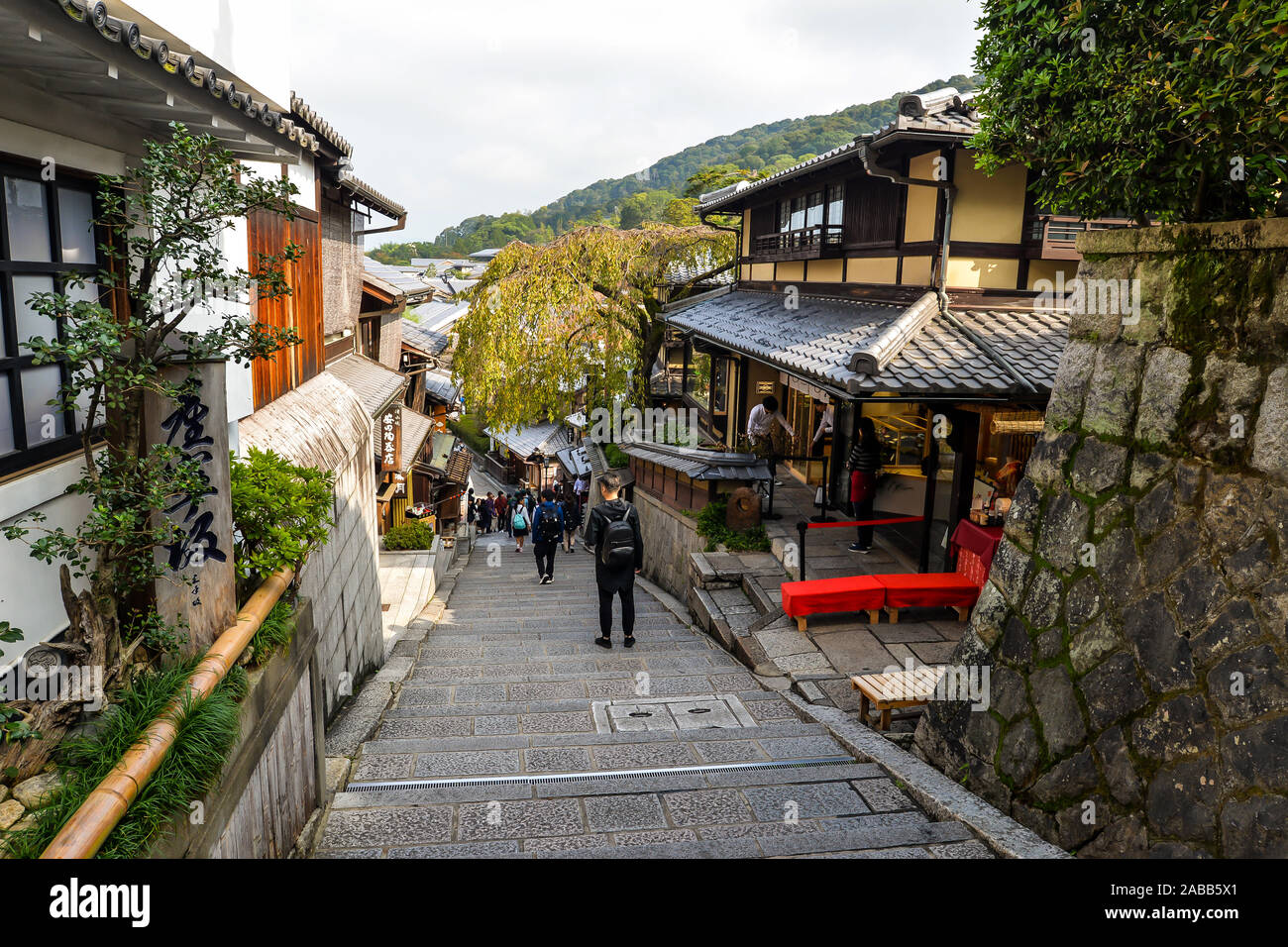 Kyoto, Japan - 10/30/19 - People in the old streets around the Kiyomizu-dera temple complex. Stock Photo