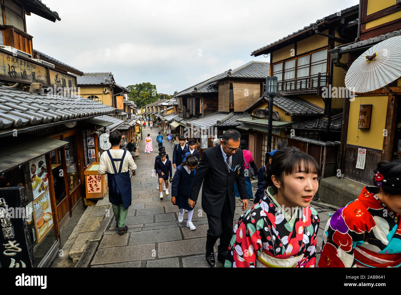 Kyoto, Japan - 10/30/19 - People in the old streets around the Kiyomizu-dera temple complex. Stock Photo