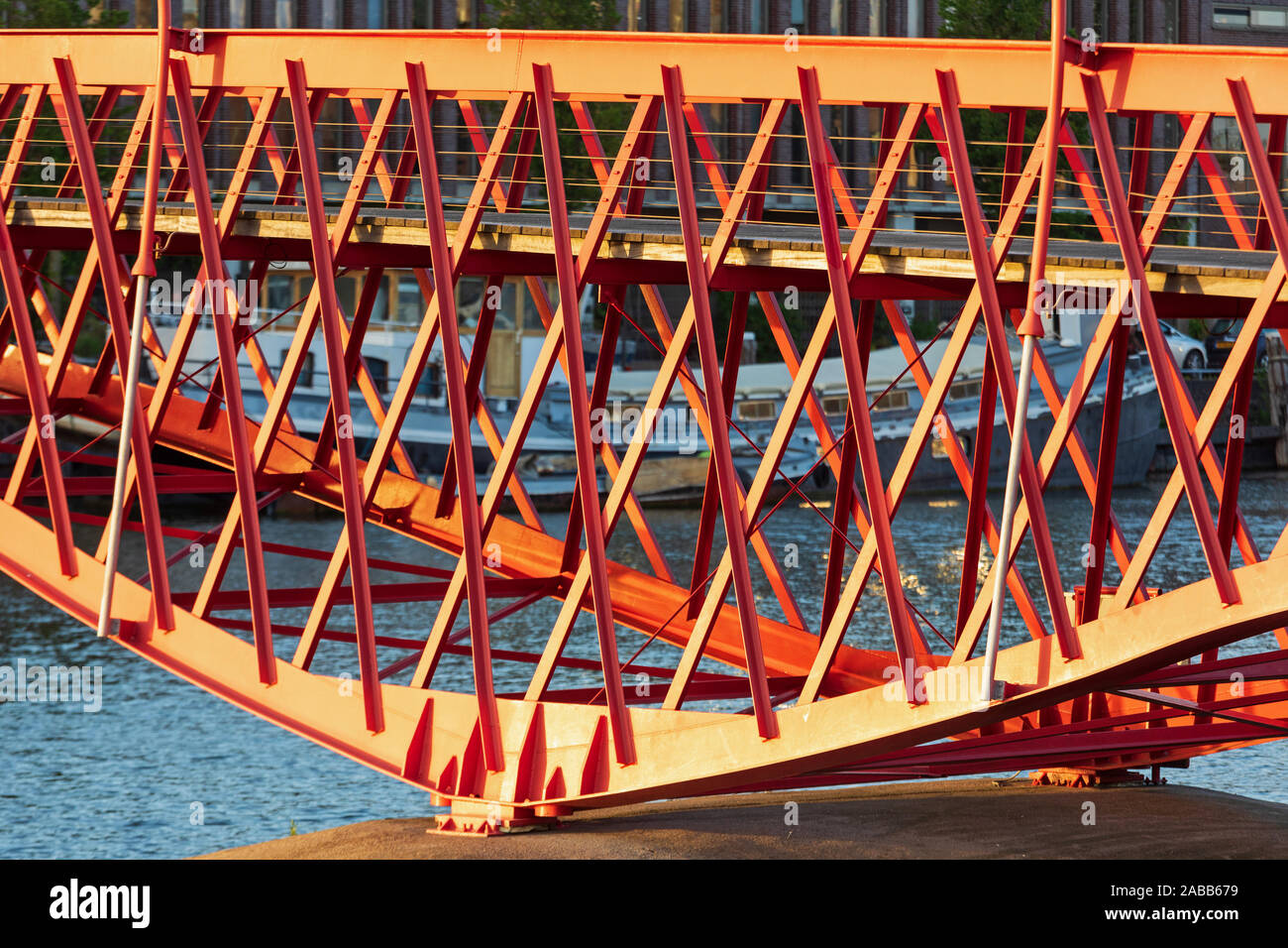Red Python Bridge Structure in Amsterdam Netherlands Stock Photo - Alamy