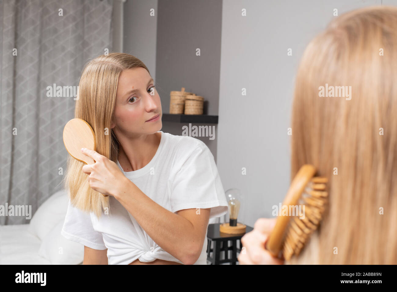 Beautiful Girl Combing Her Hair With Brush Blonde Woman Brushing