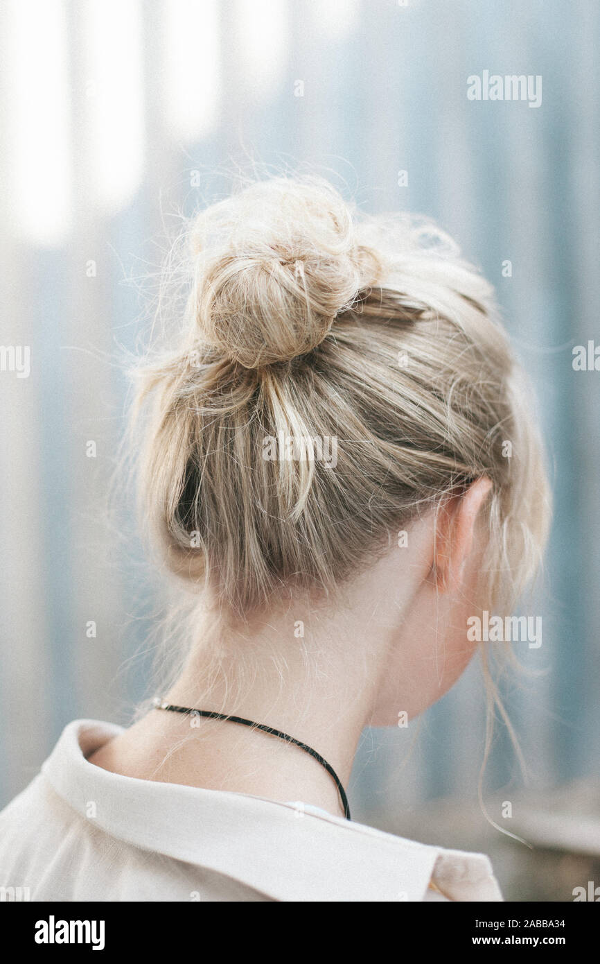 Woman close up hair bun rear view hi-res stock photography and images ...