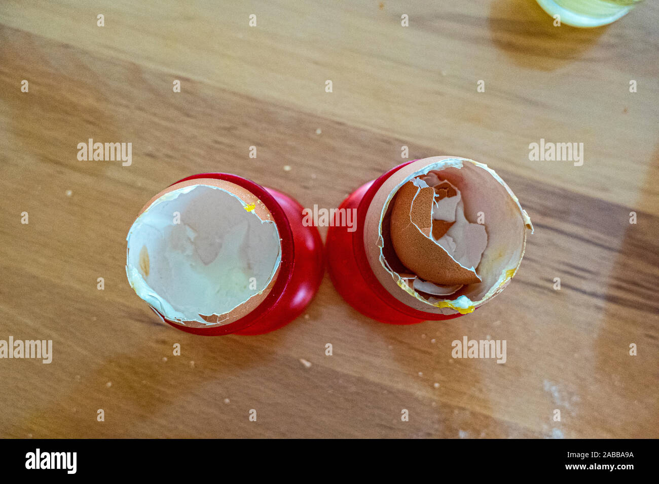Empty egg shell in egg cup red Stock Photo