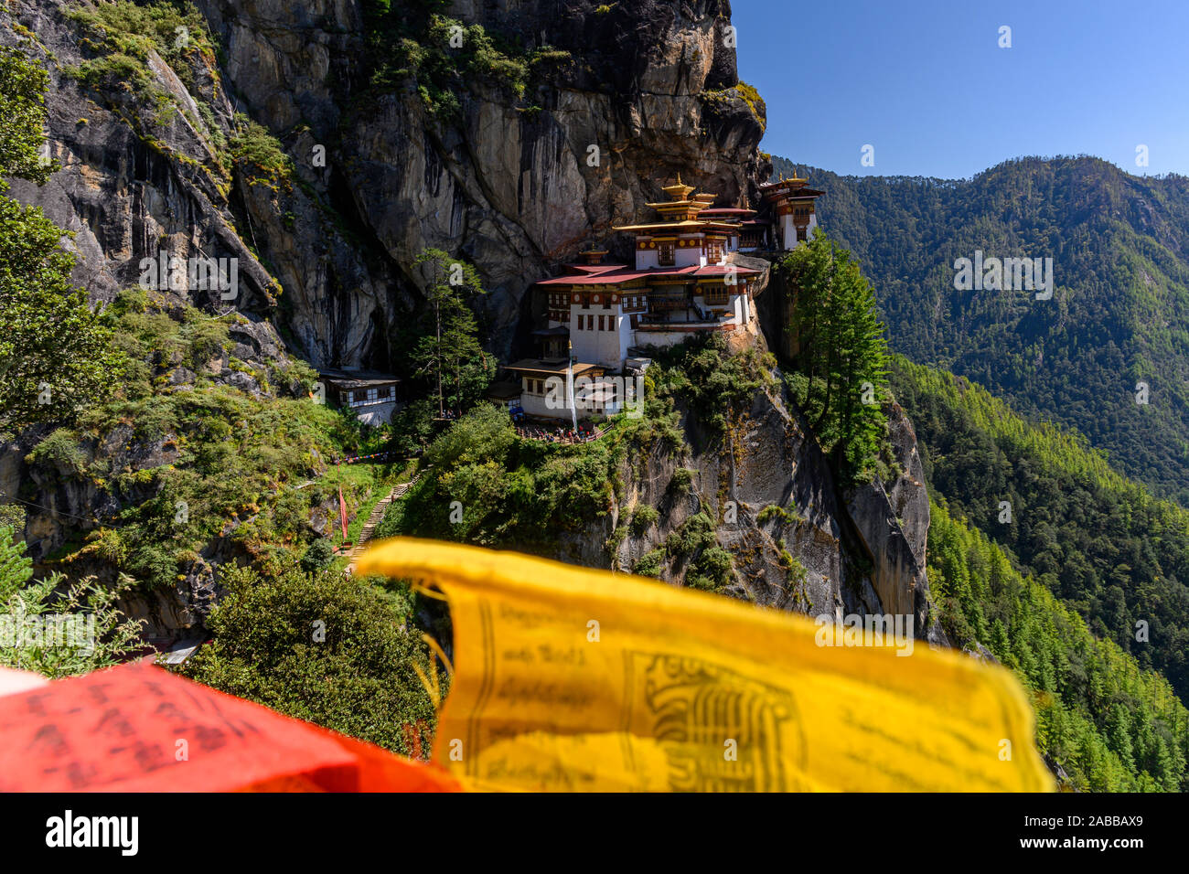 Paro Taktsang and prayer flags, Paro, Bhutan Stock Photo