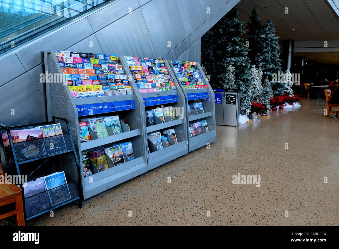 Tourist brochures and maps for local attractions on display at the Seattle-Tacoma International Airport, Seattle, Washington, USA. Stock Photo