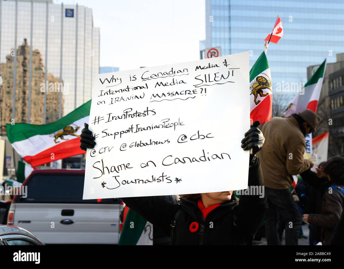 Torontonians gather at Mel Lastman Square in support of the protesters in Iran while condemning Canadian media for their silence. Stock Photo