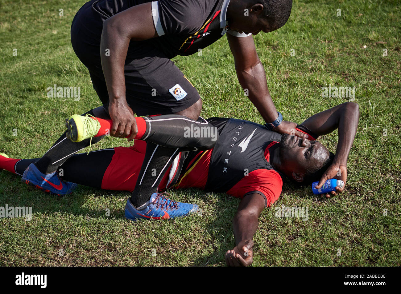 Kampala, Uganda. 15 Nov 2019. Awany Timothy Dennis (Uganda). Emmanuel  (Physiotherapist, Uganda) works on XXXX. Uganda Training Camp, CAF Nations  Cup  African Cup of Nations Qualifier. Nelson Mandela Stadium at Namboole.