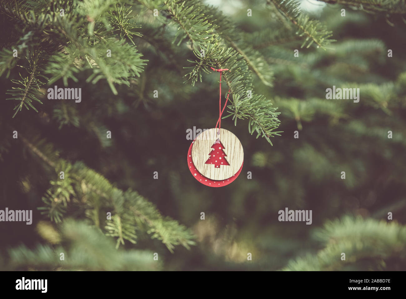 Christmas tree ornaments on fir tree Stock Photo