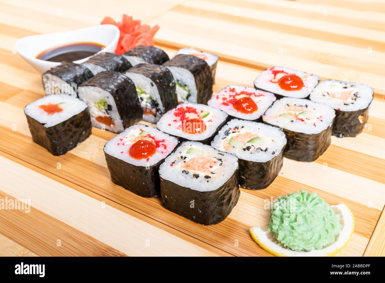 Set of rolls with various fillings, shrimp, salmon and tuna. Close-up. Stock Photo
