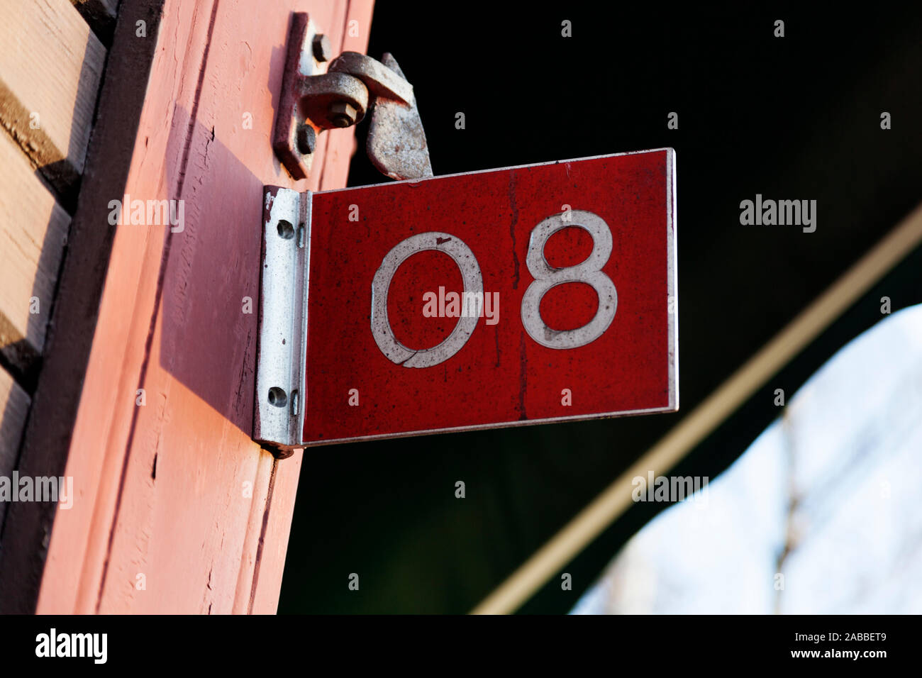 figure eight with white text on red background Stock Photo Alamy