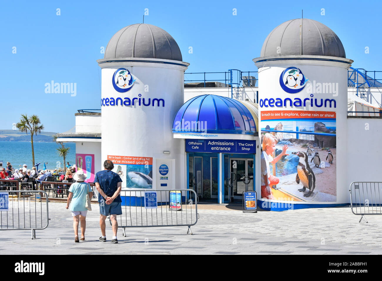 People & Oceanarium Aquarium an all weather visitor attraction on the seafront at the seaside resort & sandy beach at Bournemouth Dorset England UK Stock Photo