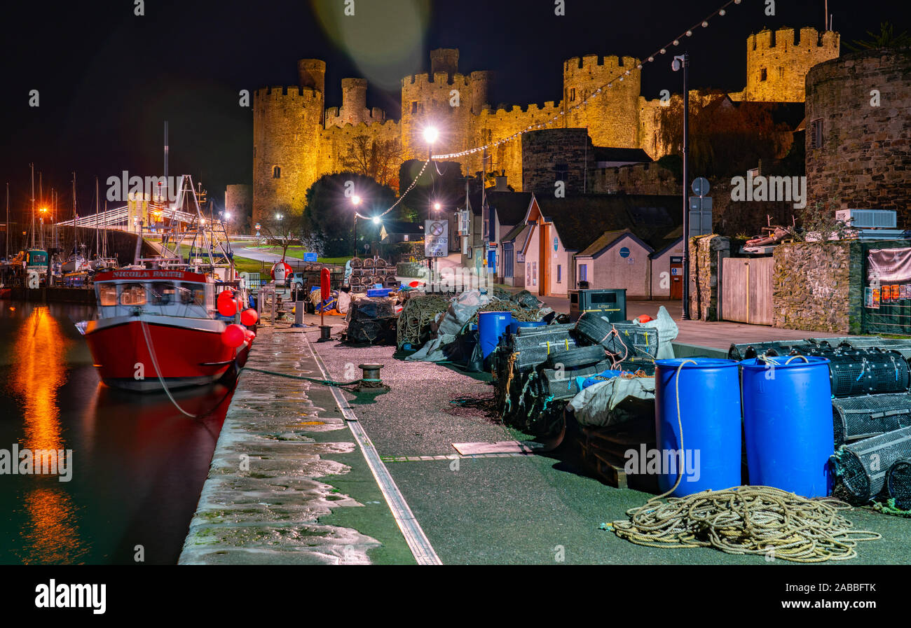 Nicola Faith Fishing Boat, Conwy Castle, and the River Conwy, Conwy, North Wales. Image taken in the Autumn of 2019. Stock Photo