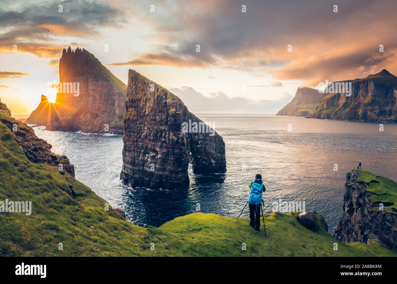 A wonderful view of Drangarnir and Tindhólmur at sunset from the island of Vagar. Faroe Islands Stock Photo