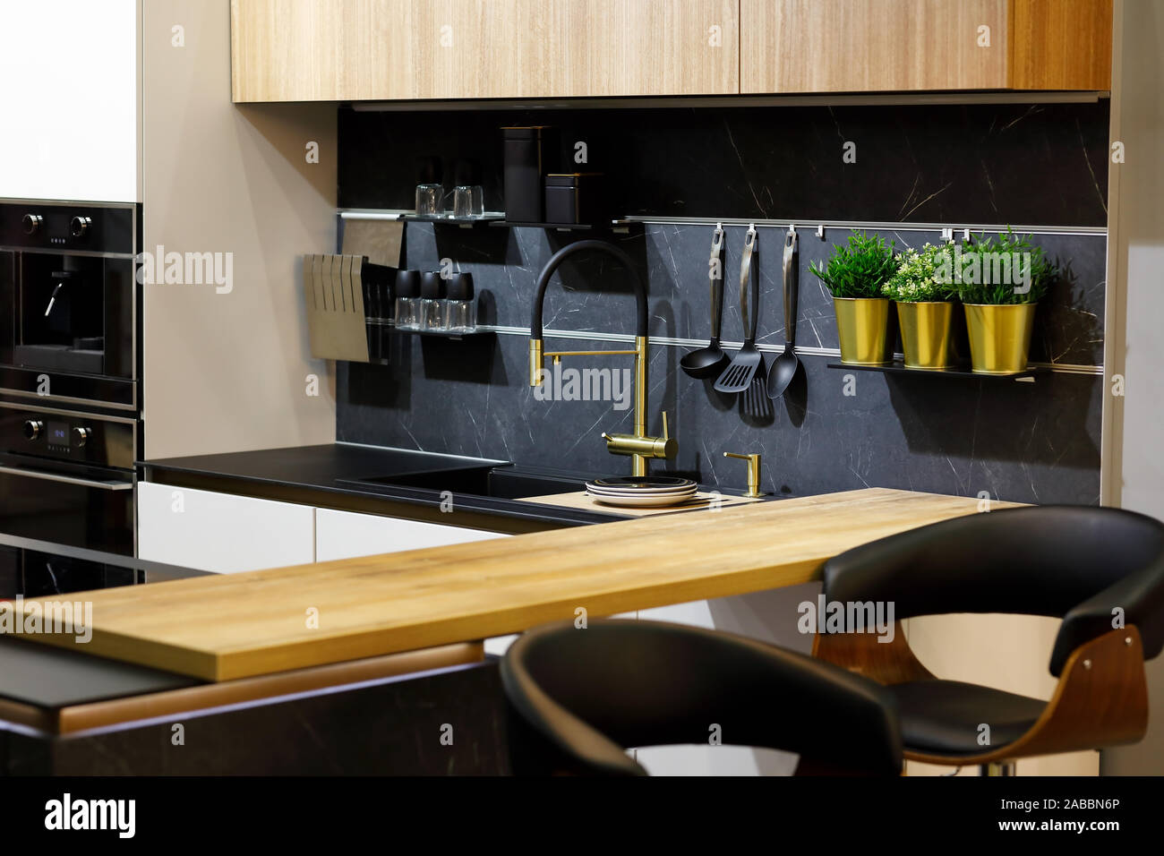 Modern stylish kitchen with breakfast bar. Selective focus. Stock Photo