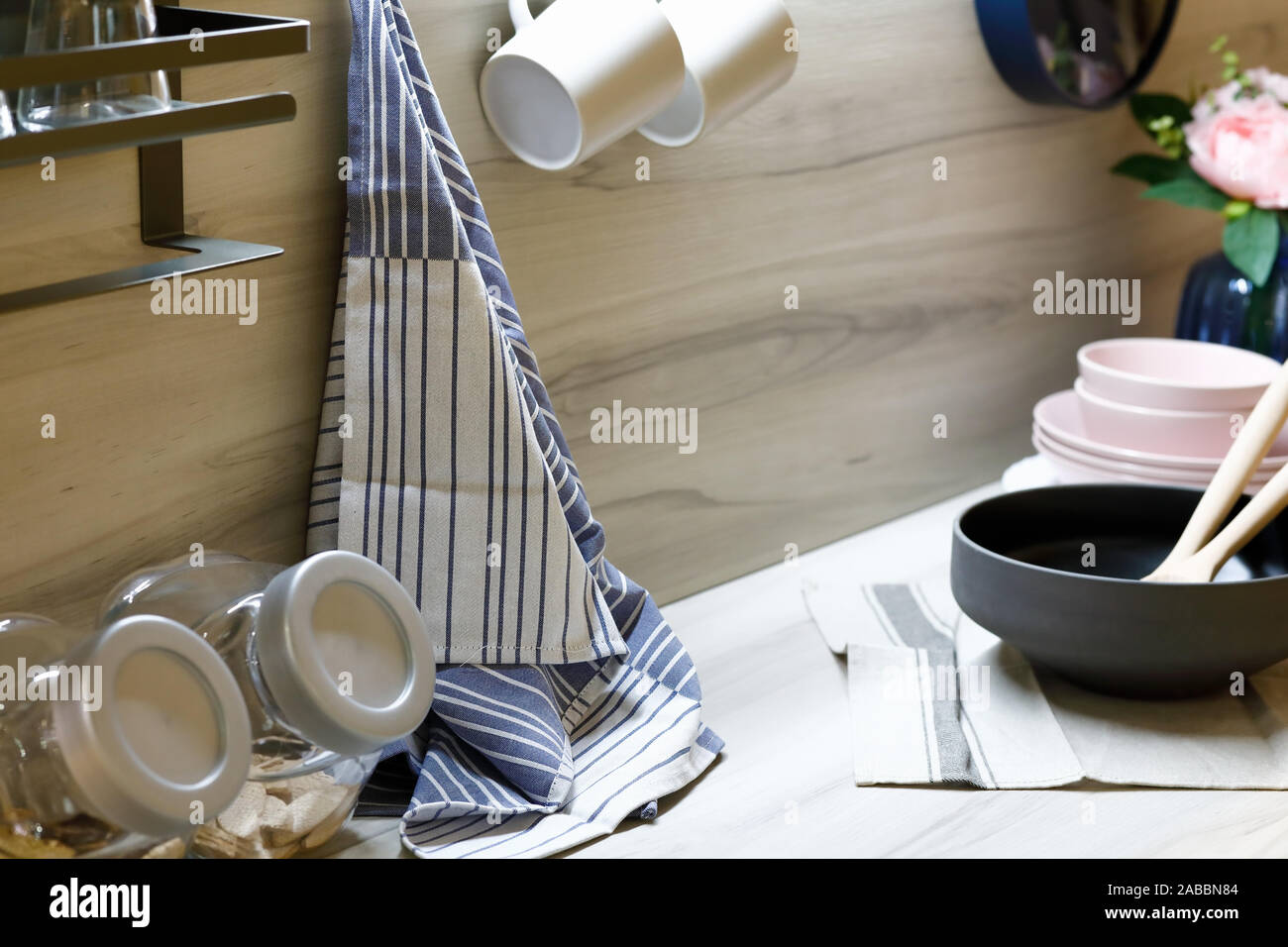 Various kitchen utensils on a modern home kitchen countertop. Selective focus. Stock Photo