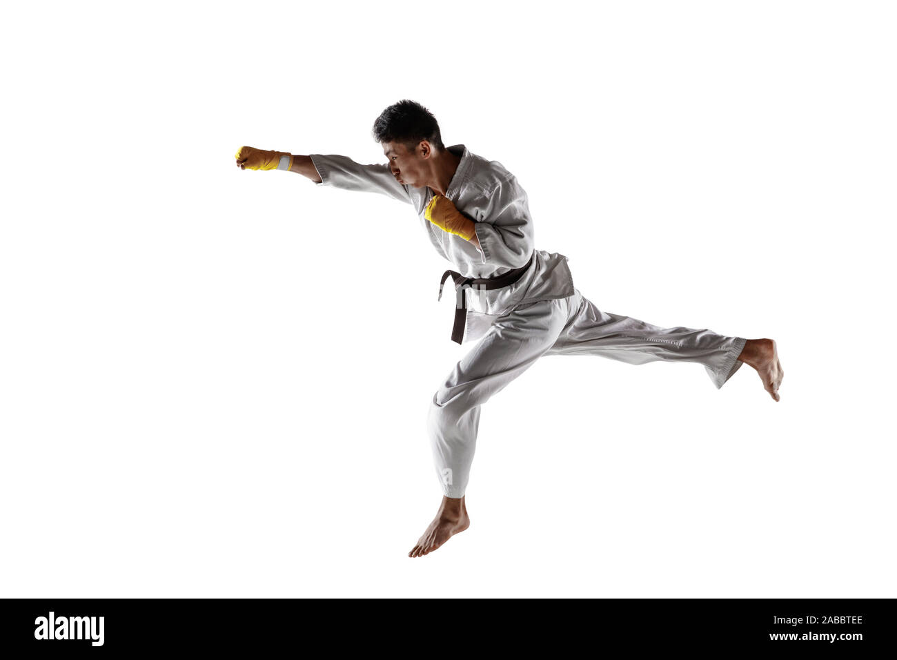 A Man, In A Black Kimono Is Practicing Martial Arts Technique With A Long  Bamboo Fighting Stick. Stock Photo, Picture and Royalty Free Image. Image  91980191.