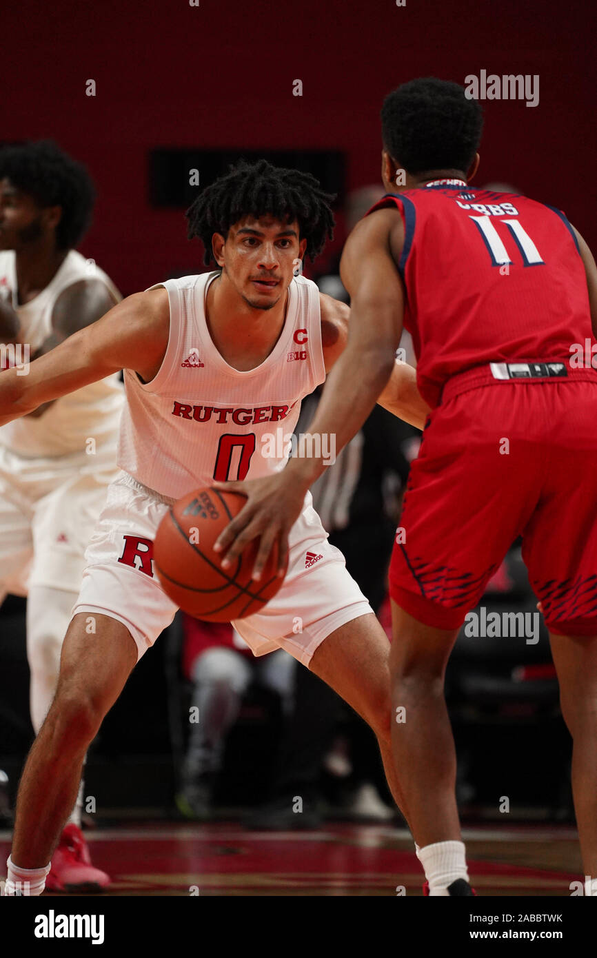 Piscataway, New Jersey, USA. 26th Nov, 2019. Rutgers Scarlet Knights guard GEO BAKER (0) defends N.J.I.T. Highlanders guard SHYQUAN GIBBS (11) at the Rutgers Athletic Center in Piscataway, New Jersey. Credit: Joel Plummer/ZUMA Wire/Alamy Live News Stock Photo