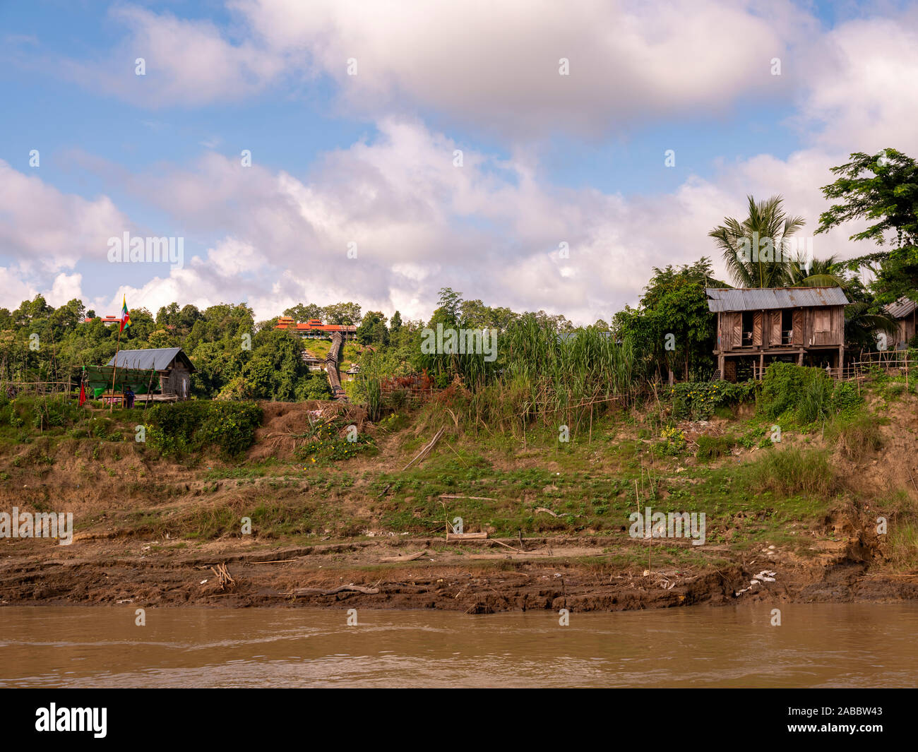 Landscape morning view of a Burmese village while cruising on the Chindwin River in northwestern Myanmar (Burma) Stock Photo