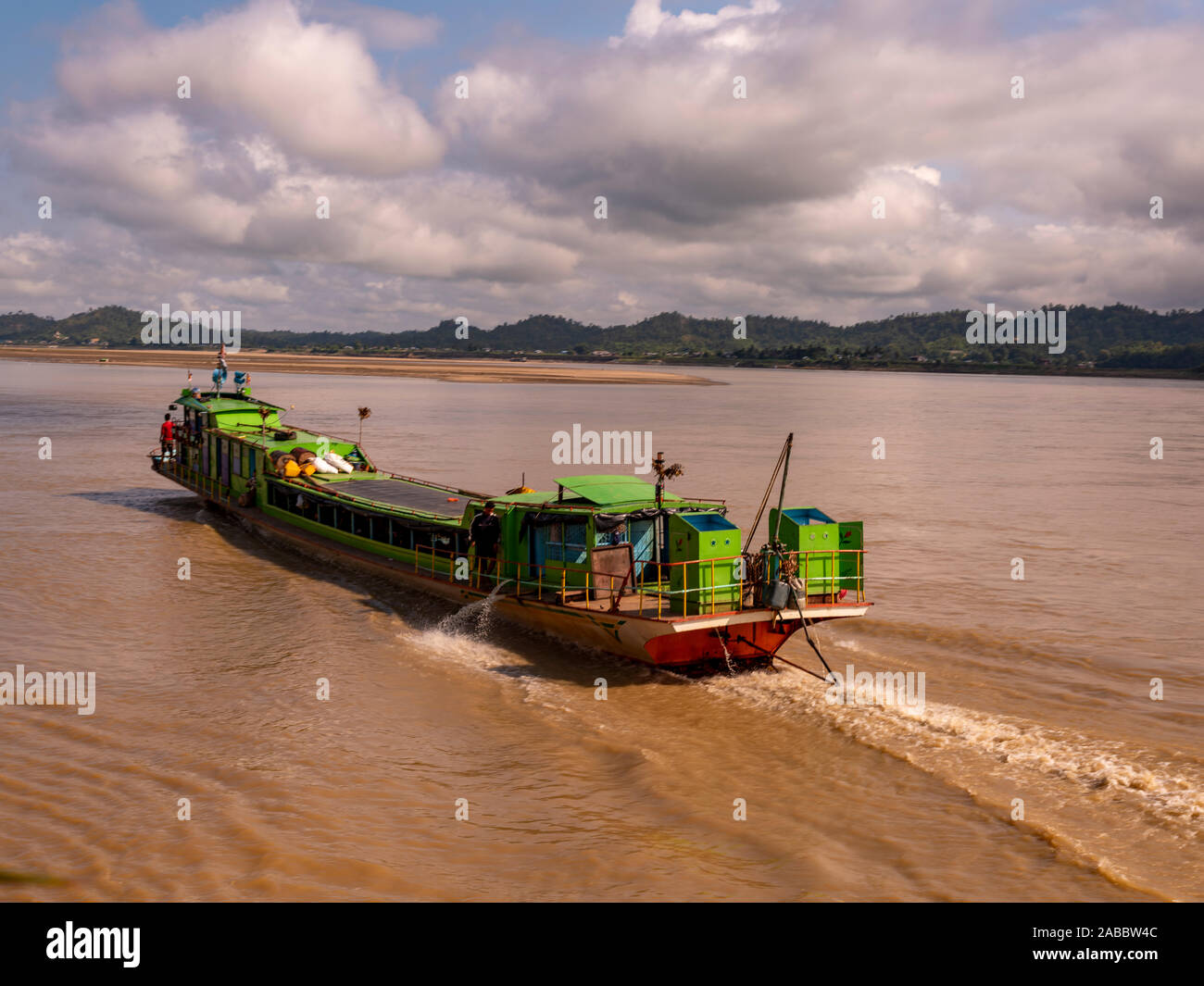 Water taxis and ferries ply the waters of the Chindwin River in northwestern Myanmar (Burma) with both passengers and freight being transported Stock Photo