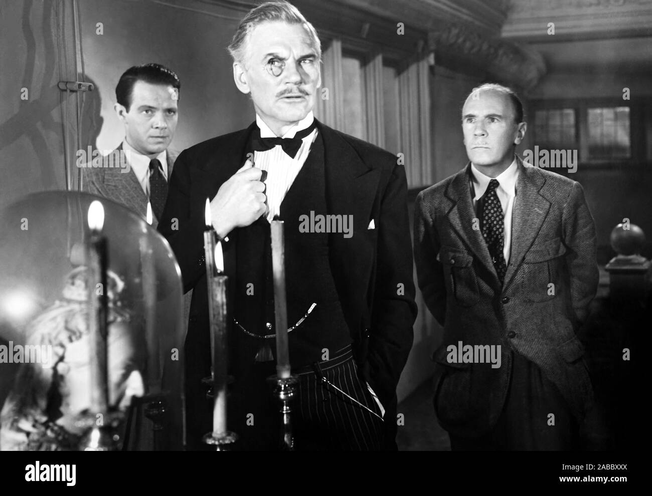 AND THEN THERE WERE NONE, from left, Louis Hayward, Walter Huston ...