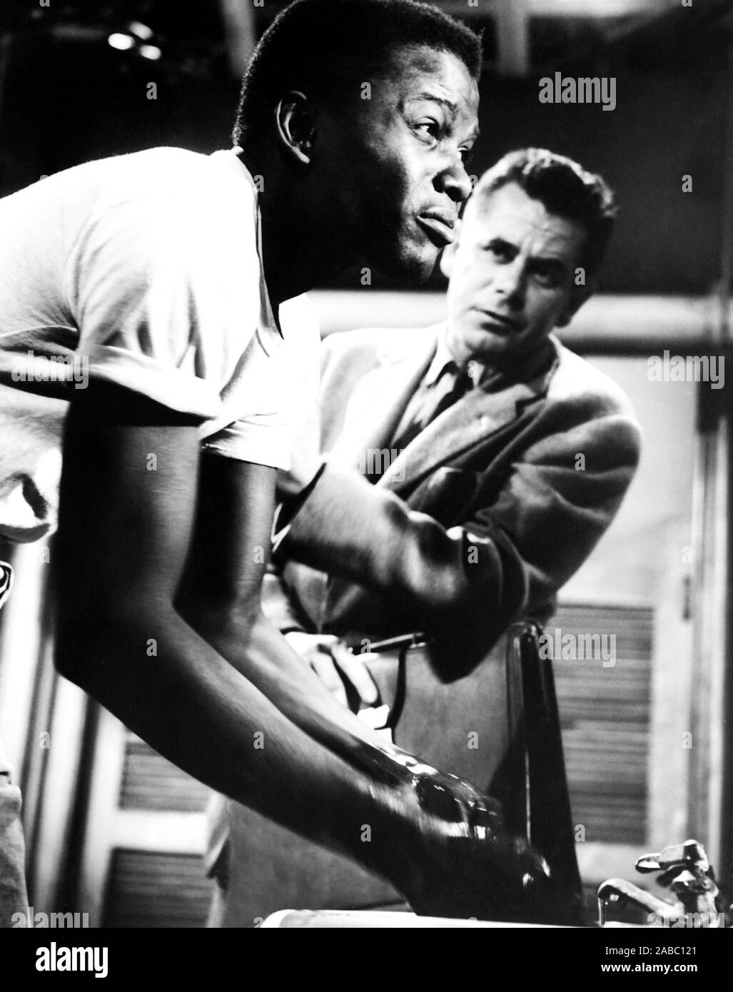 BLACKBOARD JUNGLE, from left, Sidney Poitier, Glenn Ford, 1955 Stock