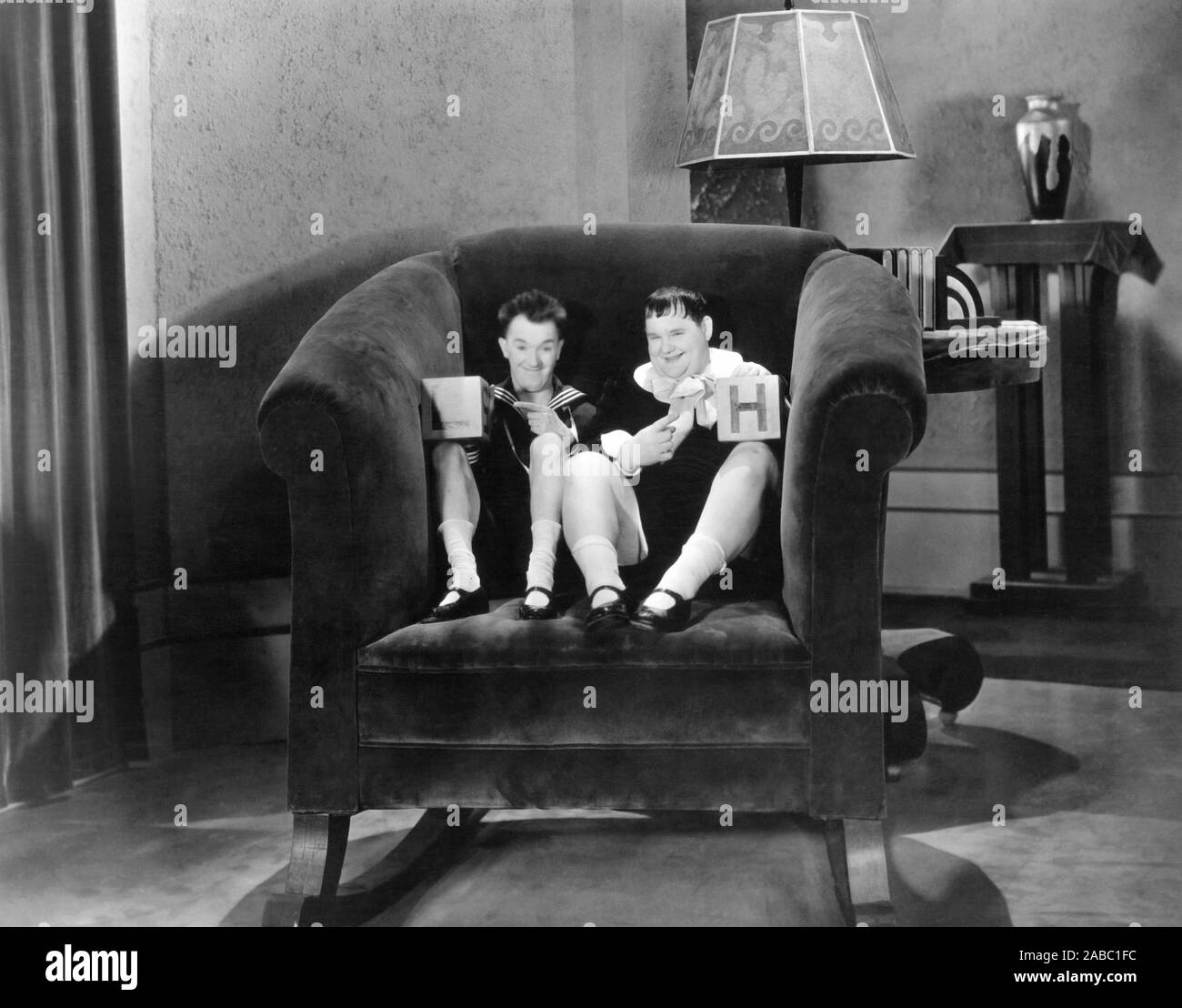 BRATS, from left: Stan Laurel, Oliver Hardy, 1930 Stock Photo