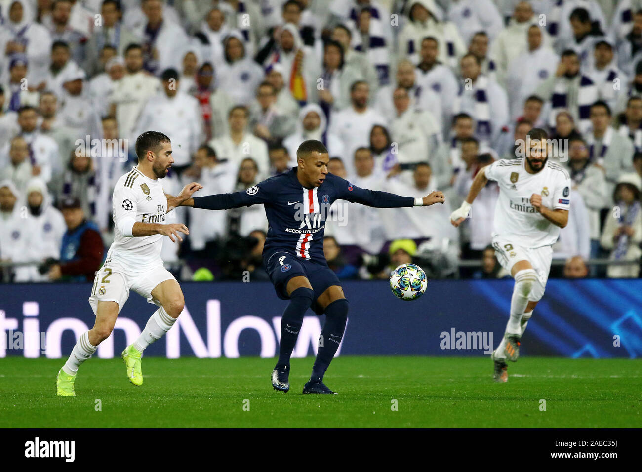 Madrid, Spain. 26th Nov, 2019. Real Madrid against PSG Champions League football group A match 5 held at the Santiago Bernabéu stadium in Madrid. Carvajal (L) and Karim Bemzema (R) Real Madrid players and Kylian Mbapee (C). Final score 2-2 Photo: Juan Carlos Rojas/Picture Alliance | usage worldwide Credit: dpa picture alliance/Alamy Live News Stock Photo