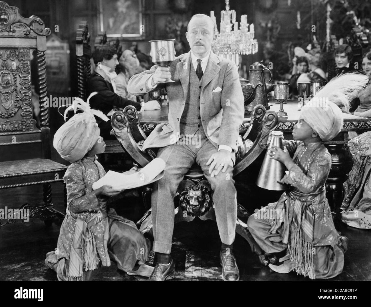 BEAU BRUMMELL, director Harry Beaumont pretending to power on set, 1924
