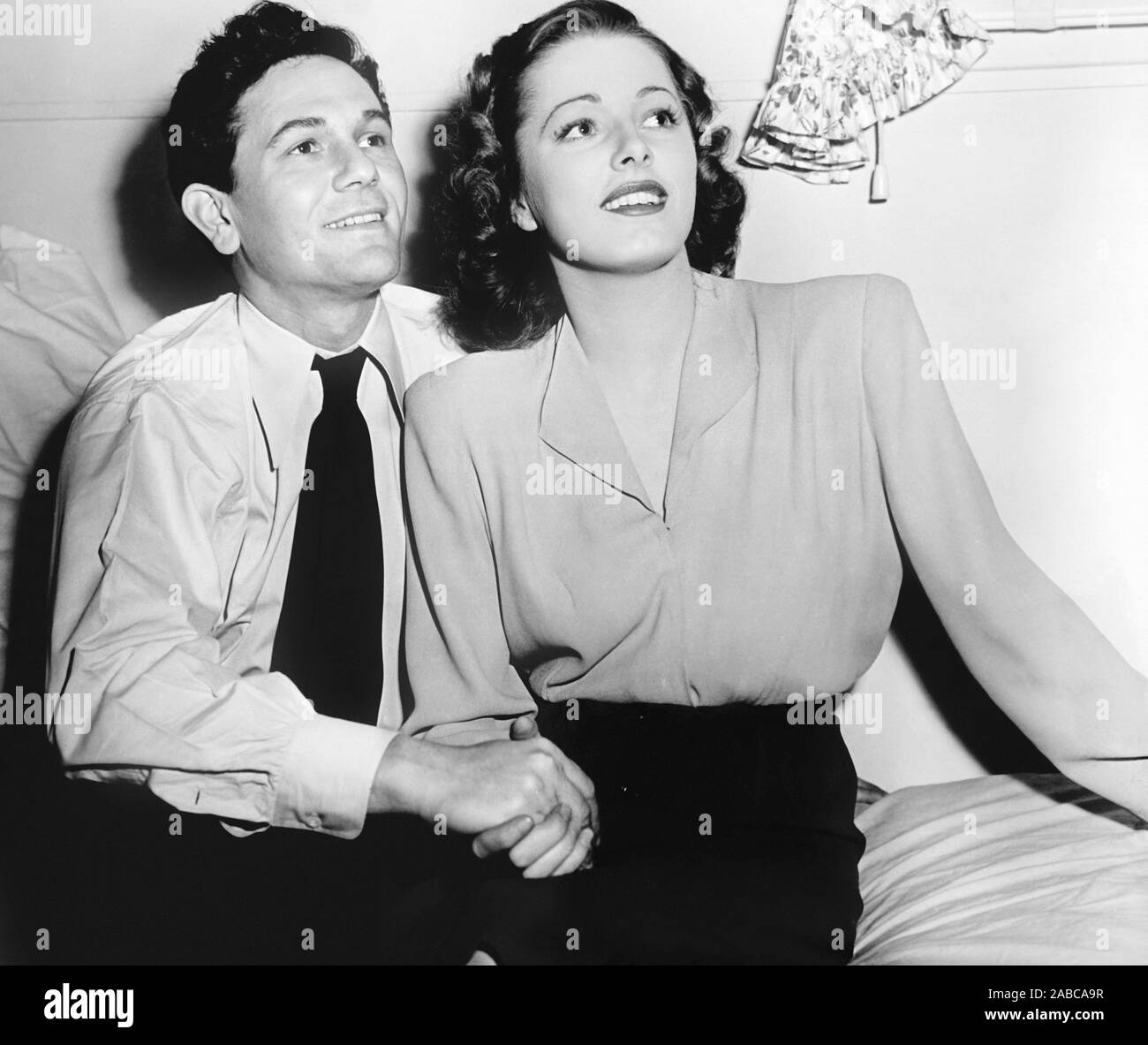 BETWEEN TWO WORLDS, from left: John Garfield, Eleanor Parker on set ...