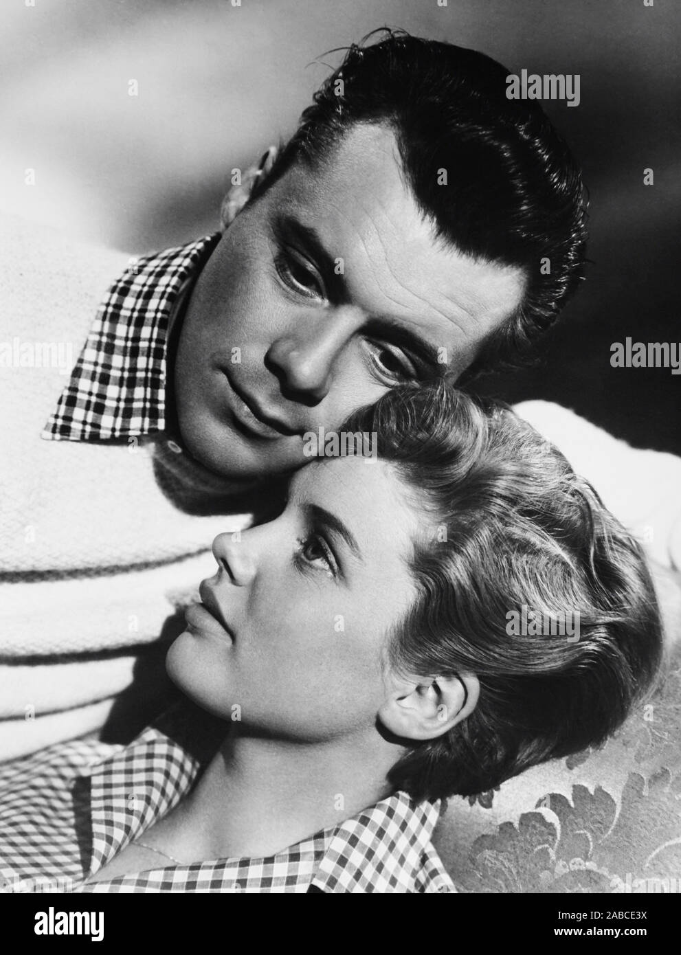 COCKTAILS IN THE KITCHEN, (aka FOR BETTER, FOR WORSE), Dirk Bogarde (top), Susan Stephen, 1954 Stock Photo