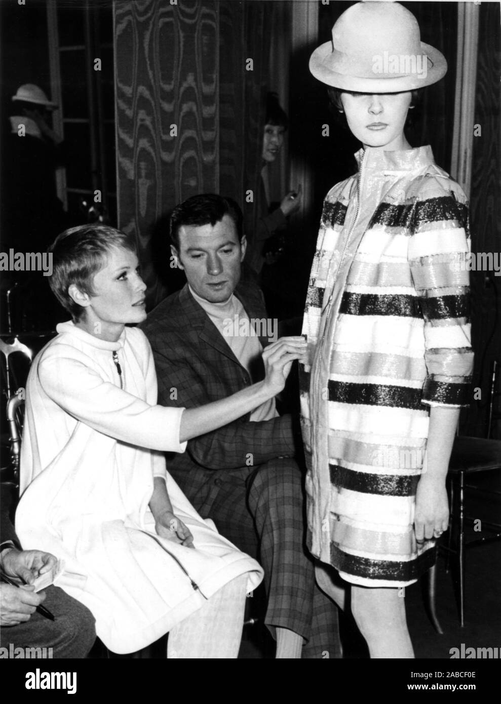 A Dandy In Aspic From Left Mia Farrow Laurence Harvey At Pierre Cardin S Salon For Wardrobe